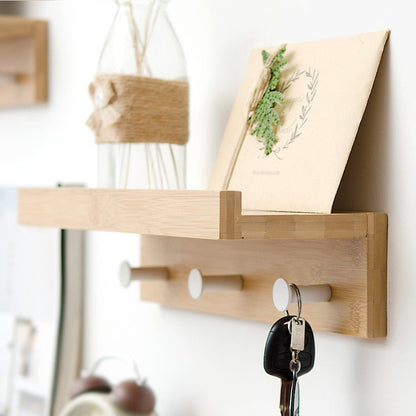 Stylish Wall Shelf with Hooks | MDF Entryway Storage Solution | 40cm x 15cm x 25cm | Brick by Brick London

MDF Wall Shelf with Hooks | 40cm Entryway Storage | Stylish Home Organizer | Durable Design | Brick by Brick London 3